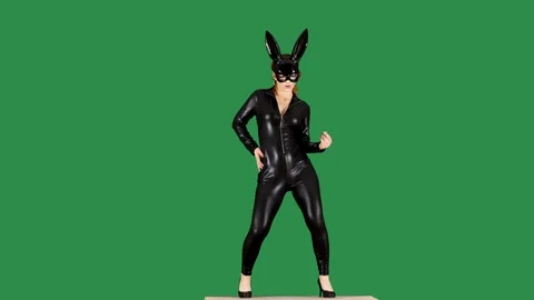 Amusing Female Dancer Wearing Kinky Leather Bodysuit Green Screen Stock Footage 105209769