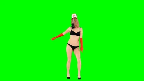 Amusing Nurse Dancing in a Horse Head Mask on Green Screen Stock Footage 106734908