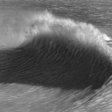 Amzing image of individual wave breaking and cresting during violent windy st Stock Photos