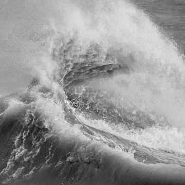 Amzing image of individual wave breaking and cresting during violent windy st 写真素材