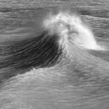 Amzing image of individual wave breaking and cresting during violent windy st 스톡 사진