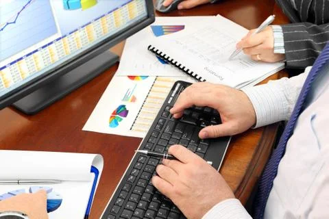 Analizing Data in the Office Stock Photos