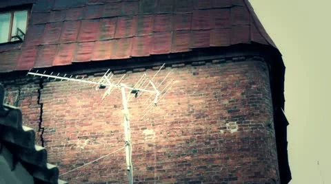 Analog antenna on rooftop. Post-production. Stock Footage 10849590
