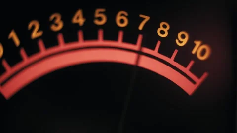 Analog Audio VU Meter Needle Moving Across Red Scale Stock Footage 329802652