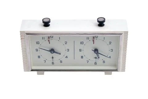 Analog chess clock on isolated white background. Vintage mechanical timer f.. Stock-Fotos