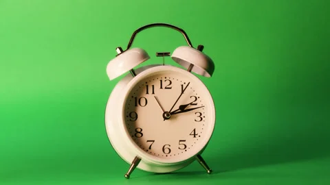 Analog clock goes on a green screen, timelapse, fast passage of time. Stock Footage 208011560