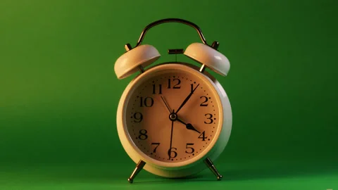 Analog clock goes on a green screen, timelapse, fast passage of time. Stock Footage 208013230