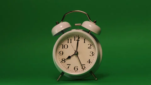 Analog clock goes on a green screen, timelapse, fast passage of time. Stock Footage 208020450