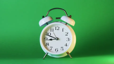 Analog clock goes on a green screen, timelapse, fast passage of time. Stock Footage 208021796