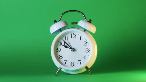 Analog clock goes on a green screen, timelapse, fast passage of time. Stock Footage 208022801