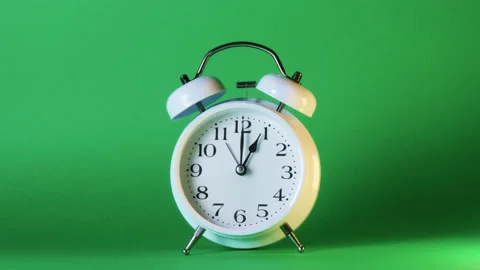 Analog clock goes on a green screen, timelapse, fast passage of time. Stock Footage 208025040