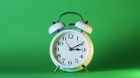 Analog clock goes on a green screen, timelapse, fast passage of time. Stock Footage 208026636
