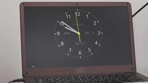 Analog clock on laptop screen. Clock wit... | Stock Video | Pond5