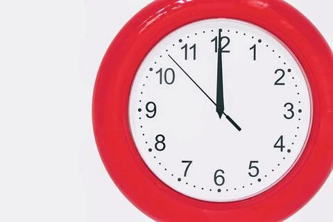 Analog clock shows the time of 12 hours Stock Photos