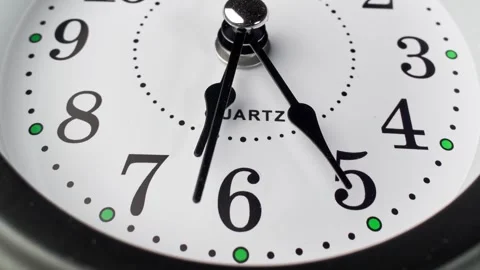 Analog clock. Time lapse of black and white vintage alarm clock Видео 329433477
