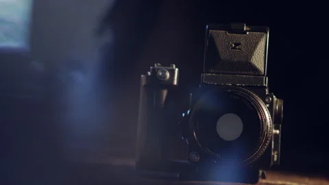 Analog film camera on a table Stock Footage 278837266