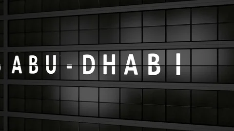 Analog flight information display board with the arrival city of Abu-Dhabi Stock Footage 93543518