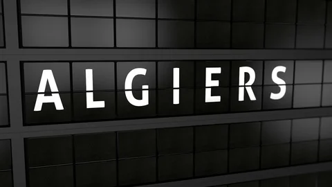 Analog flight information display board with the arrival city of Algiers Stock Footage 93543549