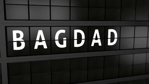 Analog flight information display board with the arrival city of Bagdad Stock Footage 93543566