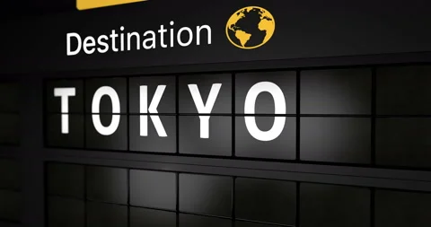 Analog flight information display board with the arrival city of Tokyo Stock Footage 146714377