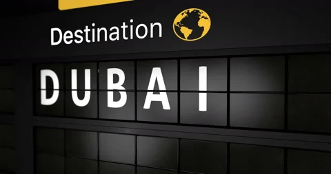 Analog flight information display board with the arrival city of Dubai Stock Footage 146714378