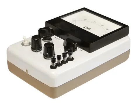 Analog old measuring and testing instrument. Isolated on white background Stock Photos