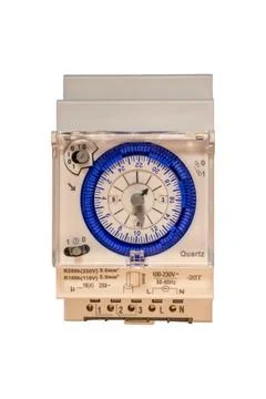 Analog quartz timer switch with 24?hour programmable electrical control 스톡 사진