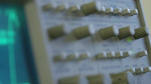 Analog screen on retro 1980s era technology - scientists measuring audio waves Video stock 61175868