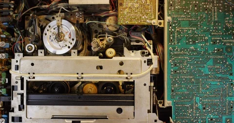 Analog VHS casette Recorder Inside. Internal functions and casette loading. Stock Footage 129811370