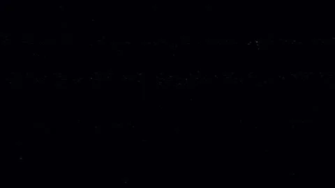 Analog VHS glitch effect with tracking lines distortion and noise dark backg Video stock 328493477