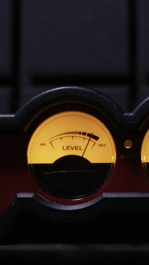 Analog VU Meter Needle Fluctuating on Audio Equipment Stock Footage 330419241