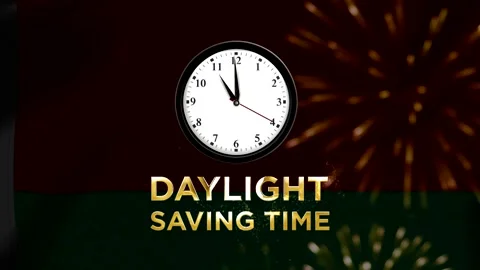 Analog wall clock displaying daylight saving time with golden glowing text 스톡 동영상 346541191