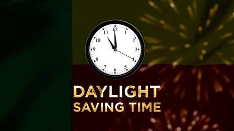 Analog wall clock showing daylight saving time on abstract golden background Stock Footage 346541213