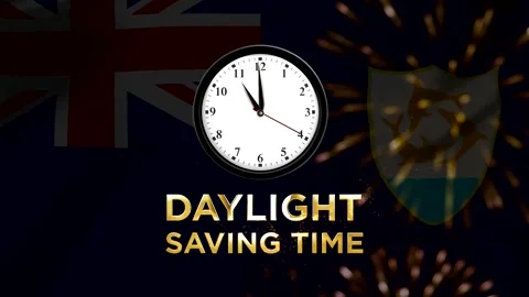 An analog wall clock showing time against the background of the national fl.. Видео 346541190