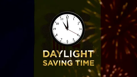 Analog wall clock showing time over the flag of Andorra with daylight savin.. 库存影片 346541230
