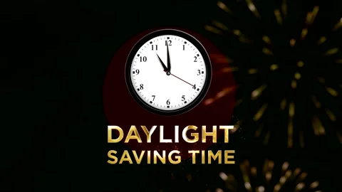 Analog wall clock showing time with daylight saving time golden text Stock Footage 346541237