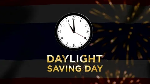 Analog wall clock showing twelve oclock with daylight saving day gold text .. Stock Footage 346541247