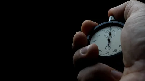 Analogue stopwatch in man hand Stock Footage 100640967