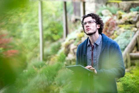 Analysing nature with digital tablet Stockfoto's
