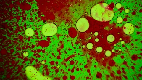 Analysis of blood tests on green screen. Green and red ink reacting on surface. Stock Footage 122059912