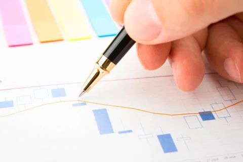 Analysis of business graphs Stock Photos