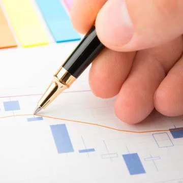 Analysis of business graphs Stock Photos