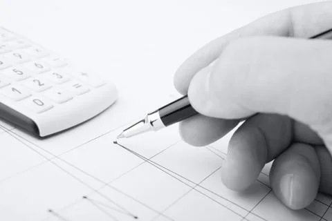 Analysis of business graphs Stock Photos