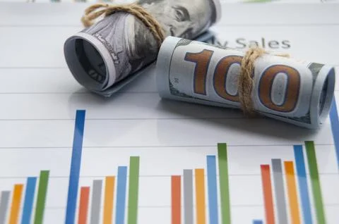Analysis of data, chart and graphs with bank notes background. Business fin.. Stock Photos