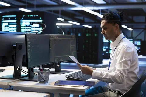 Analysis, engineer and report at data center for technical documentation Stock Photos