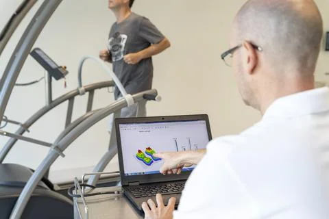 Analysis of a patient's running on a treadmill Stock Photos