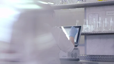 The analysis is performed in the food laboratory Stock Footage 92372390