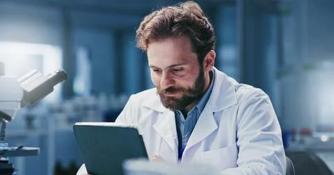 Analysis, science and tablet with man in laboratory for medical development.. Stock Photos