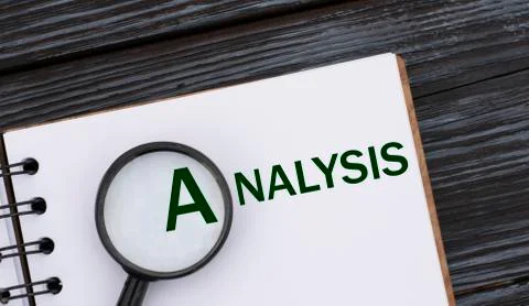 ANALYSIS word written in a notebook on a dark beautiful background with a mag Stock Photos