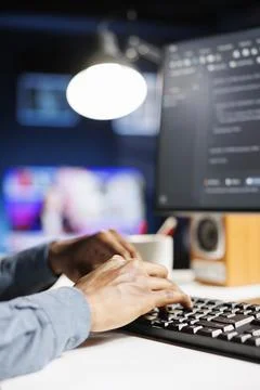 Analyst applies programming skills to supply server security 库存照片